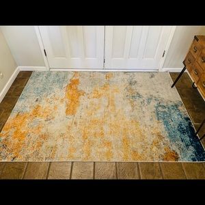 Brand New large Area Rug; size 8 1/2 by 11 ft.  Never Used!
